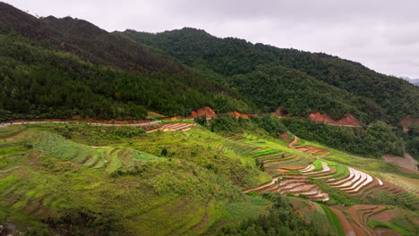 motorcycles driving in vietnamese landscape, ha giang loop, vietnam