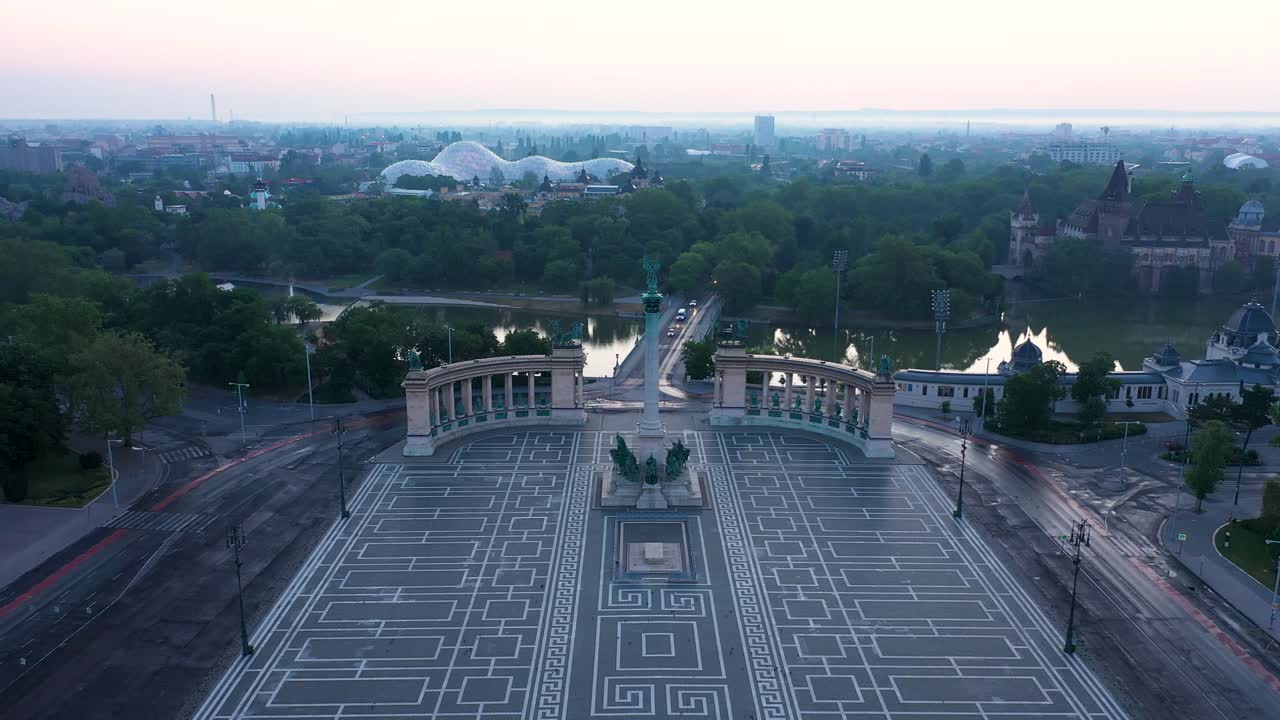 Drone footage of the empty Heroe's Square in Budapest, Hungary at the time of the Covid virus. Early morning at the sunrise in spring.Drone goes slowly forward.