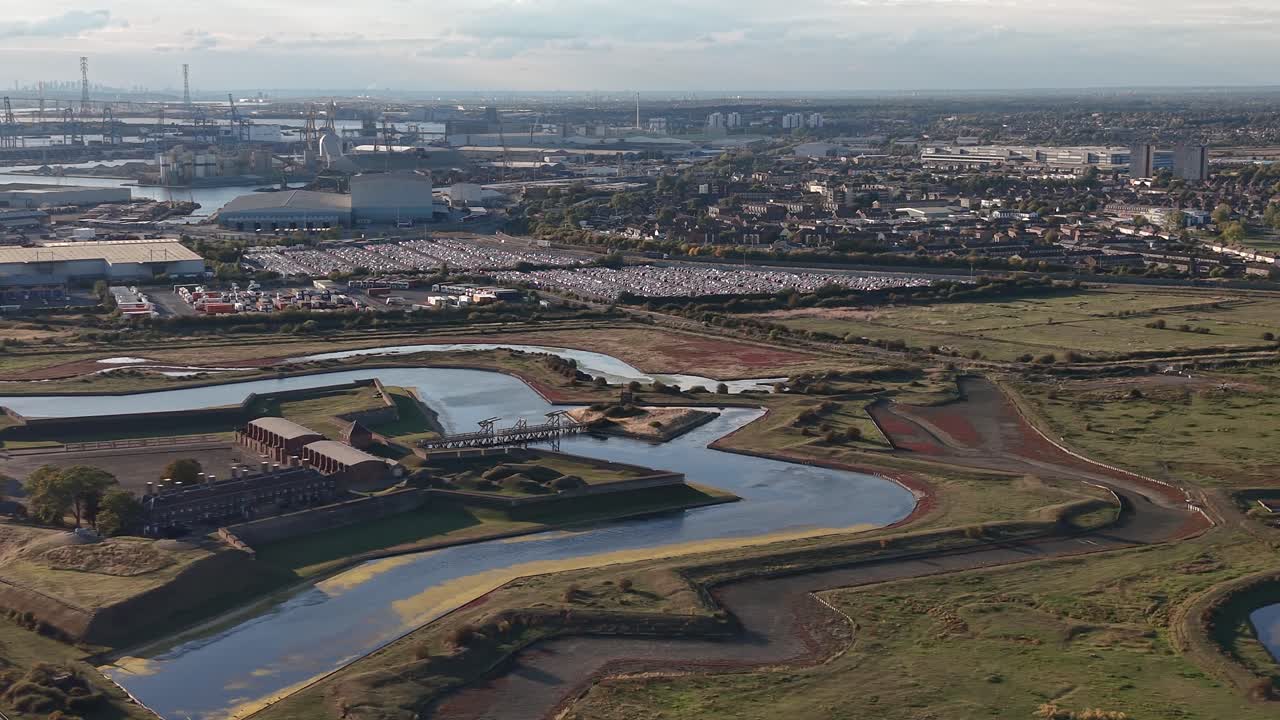 Tilbury fort star shaped walled defence aerial view across industrial river Thames landscape