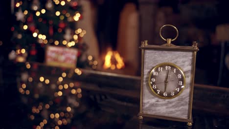 view of new year clock. new year clock before midnight on table against decorated room