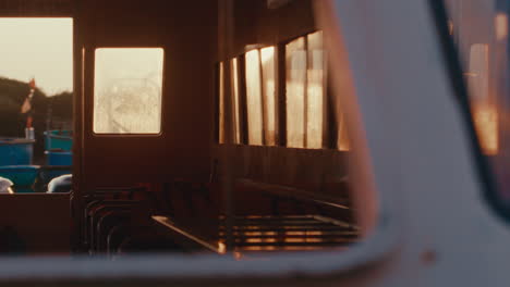 fishing boat cabin at sunset
