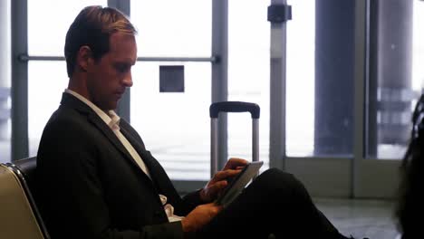 businessman using digital tablet