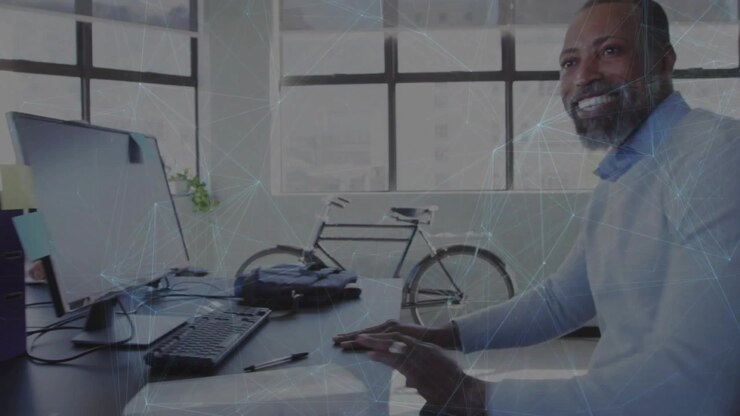 Man entering with bicycle, stowing bag while animated tags guiding headset and starting office work