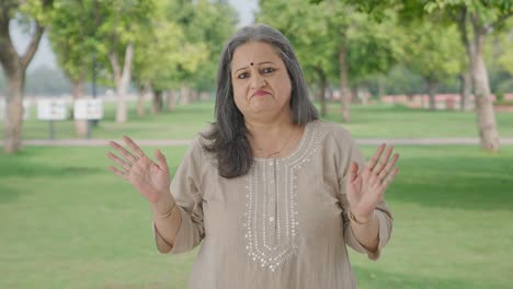 Confused-Indian-old-woman-asking-What-question-in-park