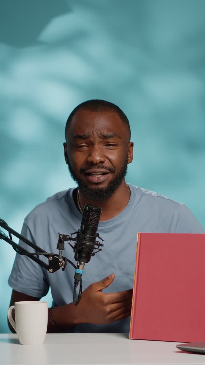 Man recording a podcast in a studio