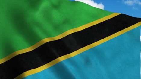 tanzania flag waving in the wind, blue sky background. 4k