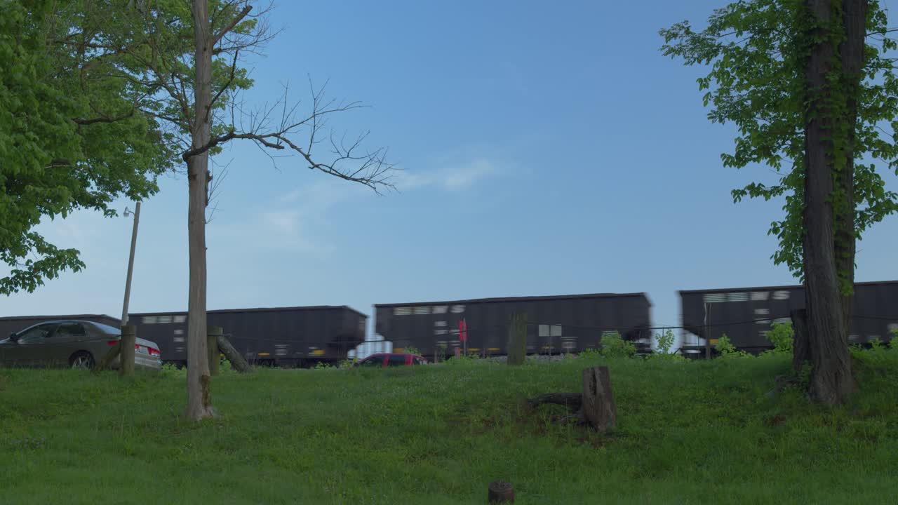 Freight Train with Hopper cars on railroad