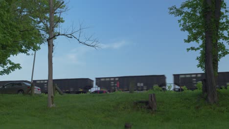 freight train with hopper cars on railroad