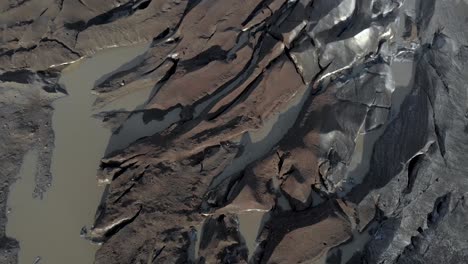 aerial slow pan upwards of a glacier