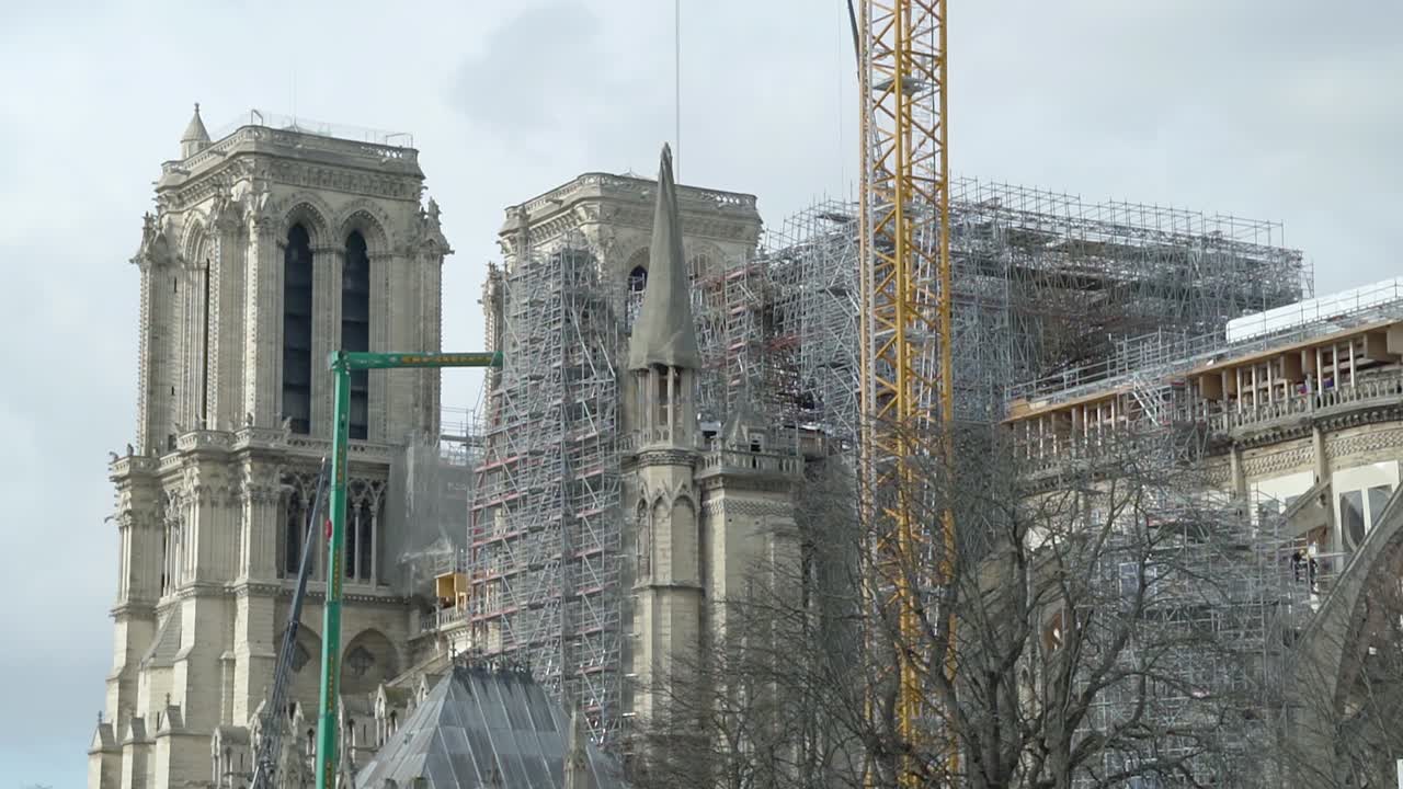 View of a crane working to restore Notre Dame in Paris