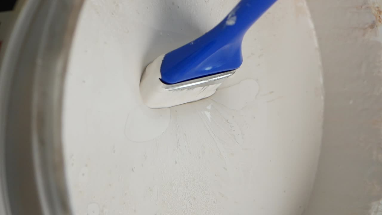 Painting a surface with white paint