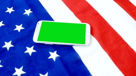 mobile phone on american flag