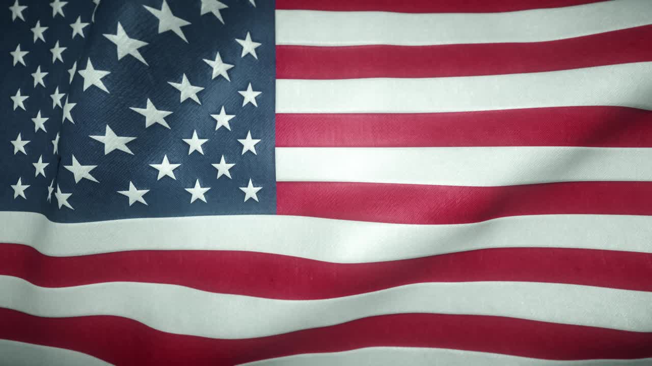 la bandera de los estados unidos ondeando en el viento.