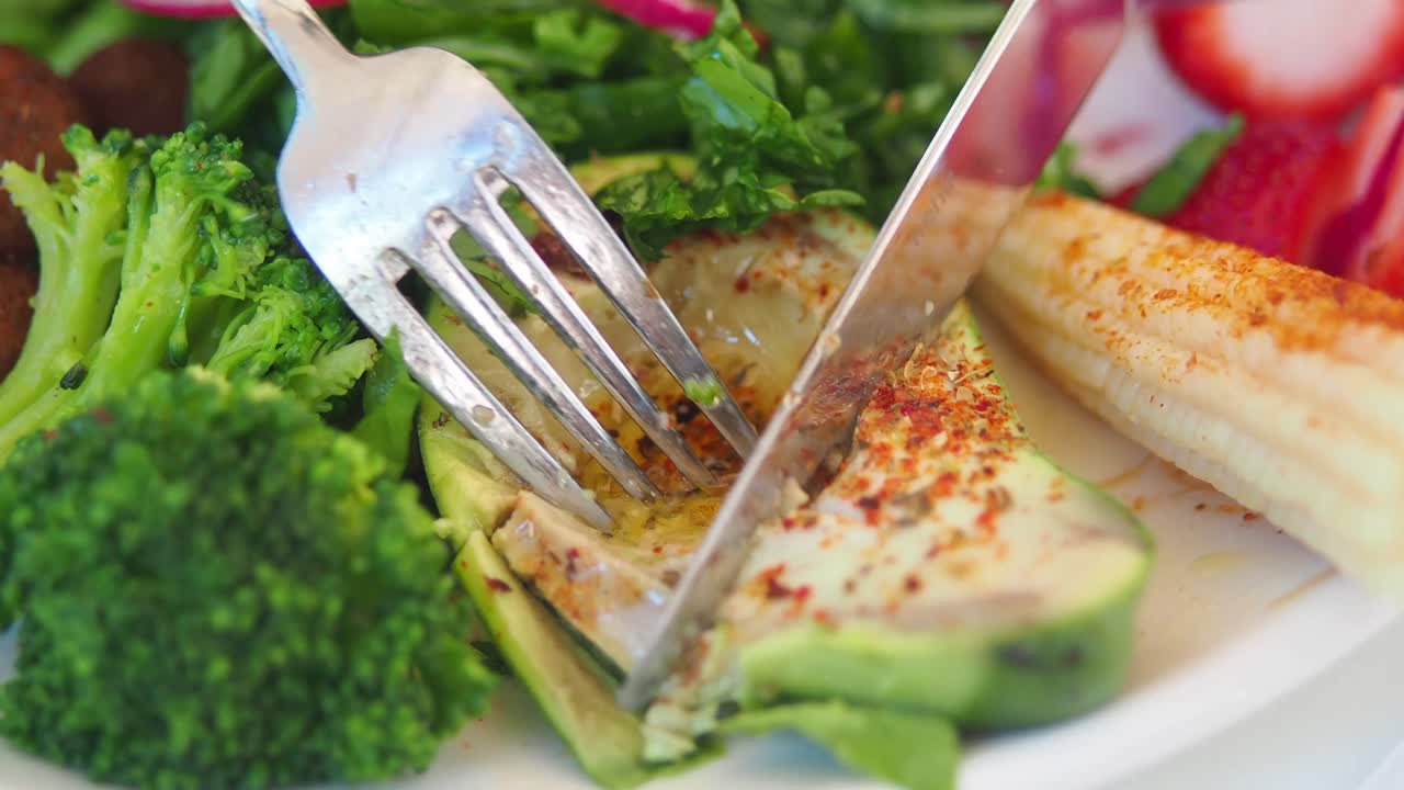 Healthy salad with avocado and broccoli