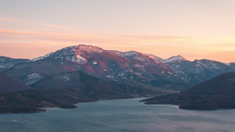 last lights of the day hitting mountain peaks in riaño, león, spain