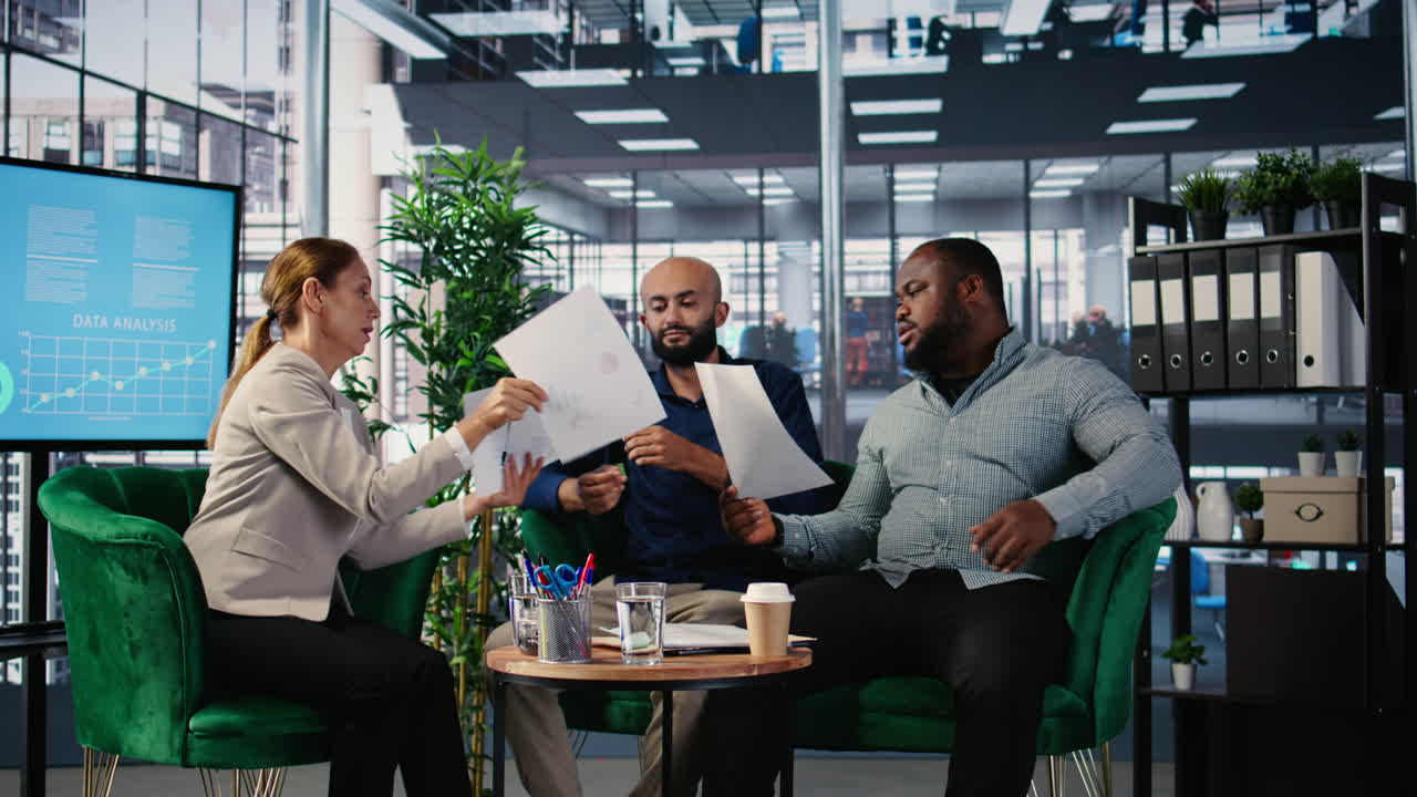 Vertical Video Diverse business professionals using analysis tools to extract insights