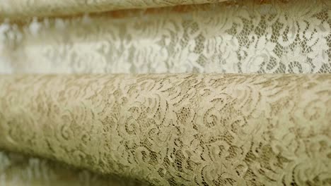 macro shot of a lace, fabric used to make elegant wedding dresses for the wedding day.