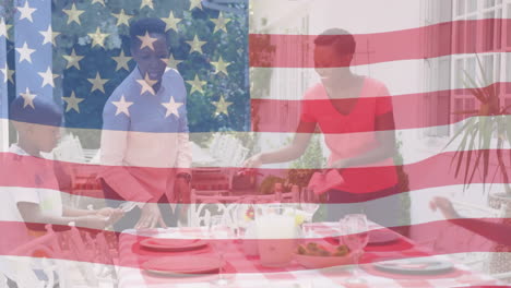 animation of flag of united states of america waving over smiling african american family