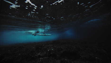 Surfer Underwater