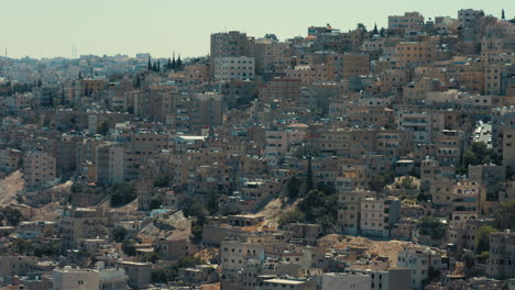 jabal al ashrafyia amman, jordan. close shot for jabal al ashrafyeh houses. urban sprawl 4k footage