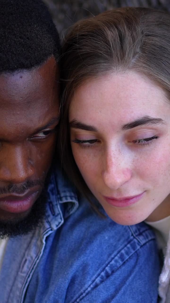 An Interracial Couple Sharing an Intimate Moment