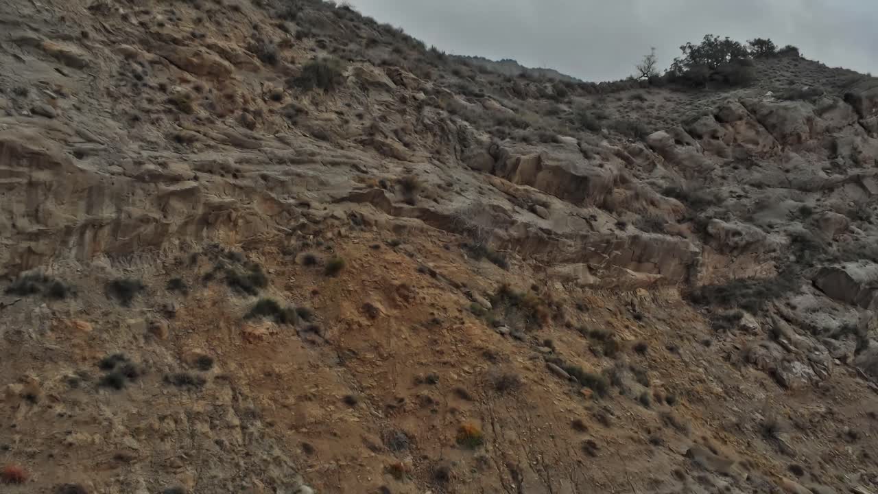 Rocky landscape in Georgia in the Caucasus region under cloudy sky