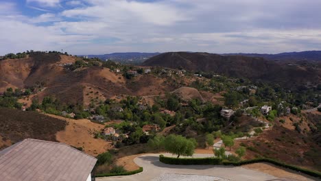 aerial flyover roof shot revealing southern ca foothill community