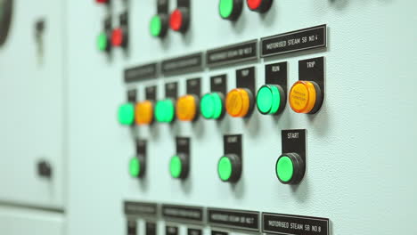 button indicators on machine controller of a palm oil factory of malaysia