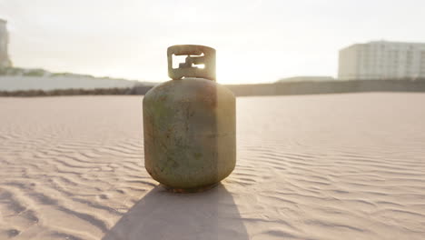 old-rusted-metal-gas-tank-on-the-beach