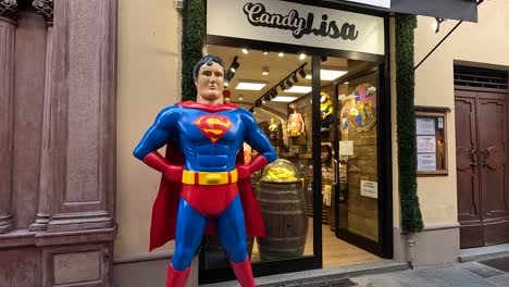 superman statue in front of candy lisa shop