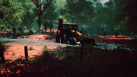 tractor de excavadora en el bosque