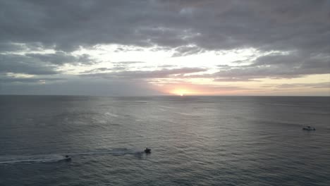 cloudy sunset sky over endless rippling sea