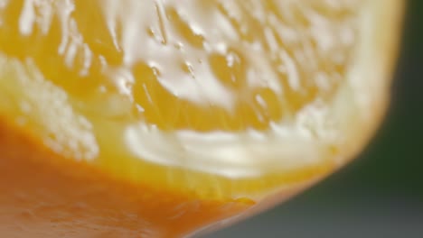 Juice-Flows-Down-Surface-of-Sliced-Orange