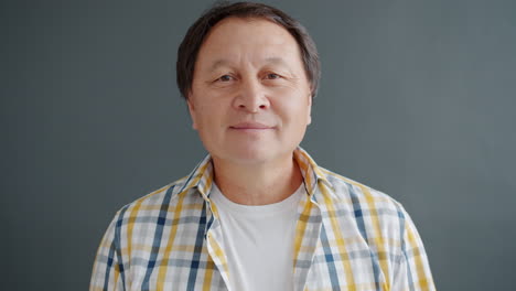 portrait of a smiling asian man