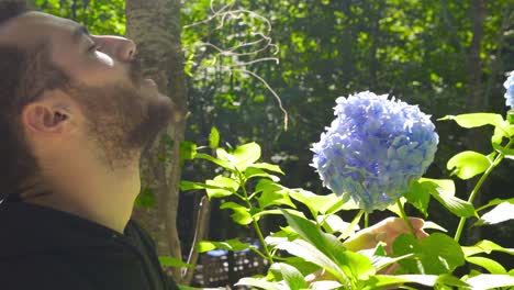 the man who smells the flowers.