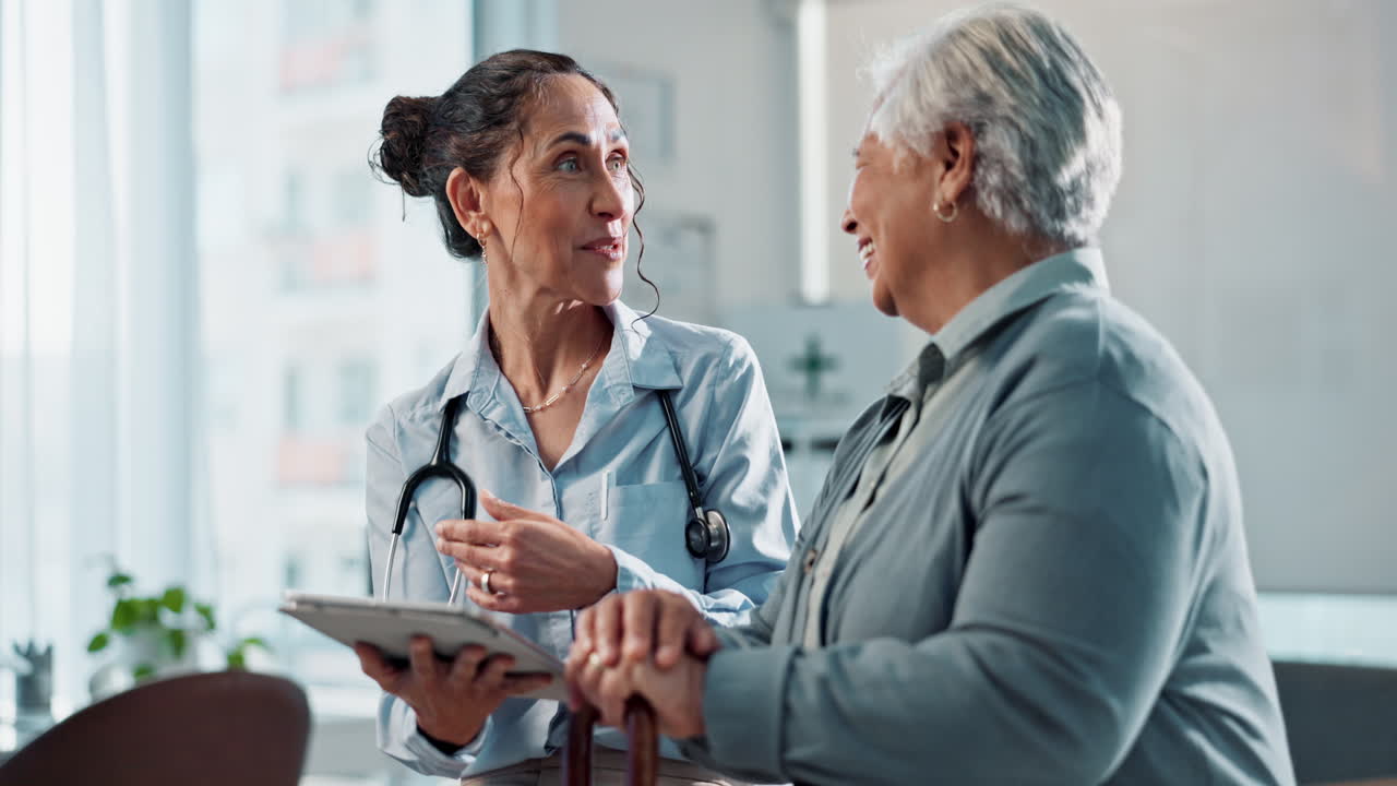 Doctor and Elderly Patient Talking During a Medical Consultation