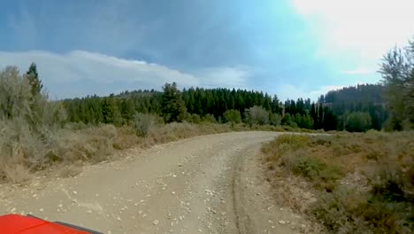 hyperlapse point of view of a drive along a rugged trail in the mountains