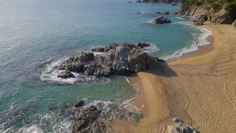 Mediterranean-Beach-Paradisiaca-Turquoise-Blue-Waters-No-People-Aerial-View-Drone-Spain-Catalunya-Costa-Brava-Blanes-Lloret-De-Mar-Mallorca-Balearic-Islands