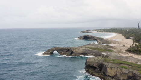 seascape of punta las tunas at cueva del indio along puerto rico north coast - aerial drone shot