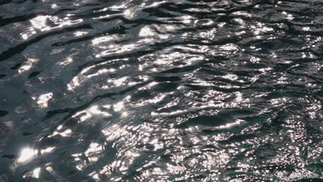 swimming pool bright sun reflecton blinking water ripples abstract background 4k
