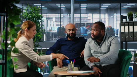 vertical video corporate professionals discussing global market trends in boardroom