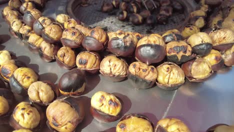 roasted chestnuts at a street food stall