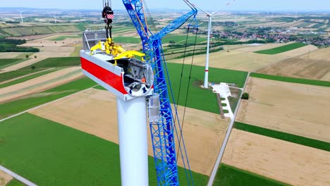 Installing-Of-Wind-Turbine-With-A-Crane---aerial-close-up