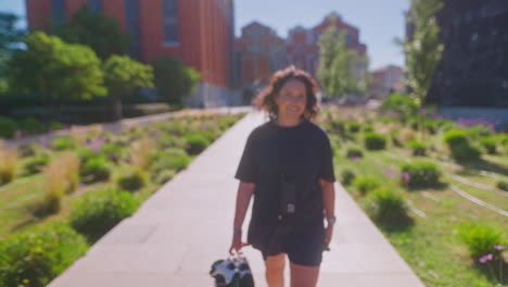woman walking in city park