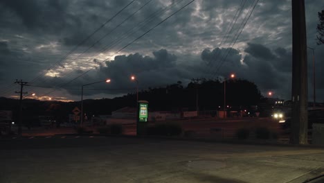 overcast sky and streetlights at dusk