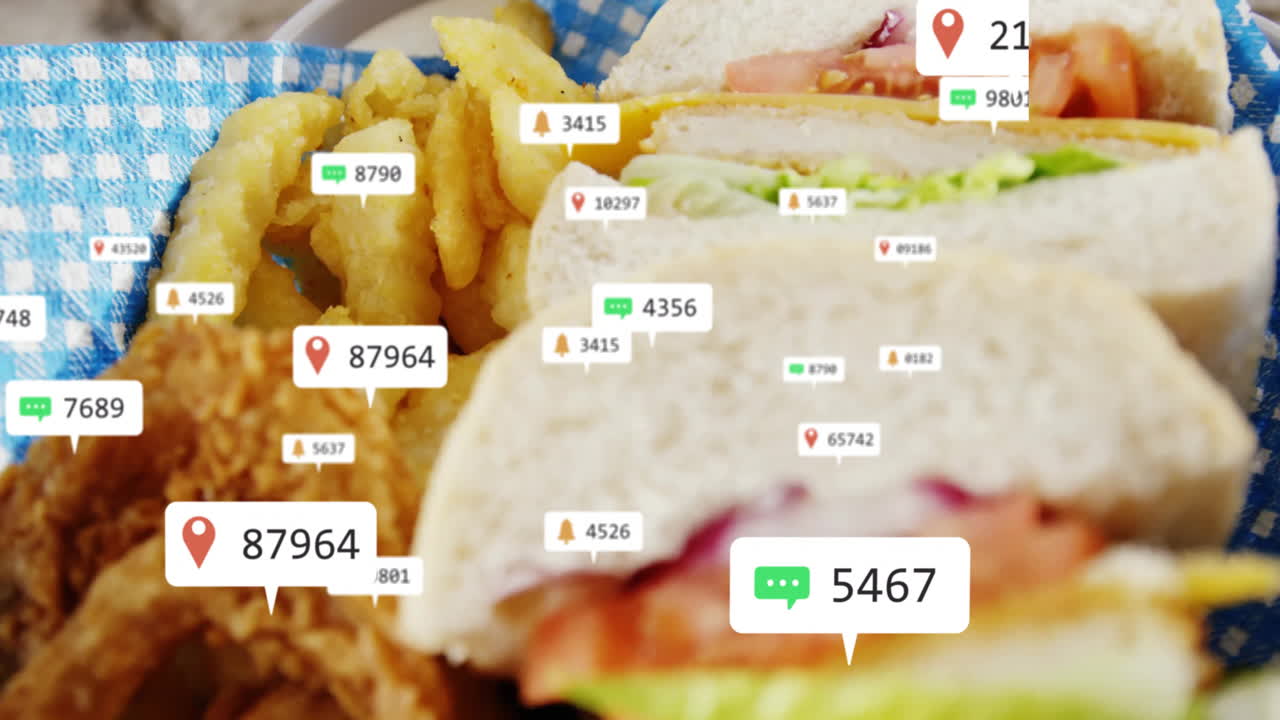 Social media interaction icons animation over sandwiches and fries