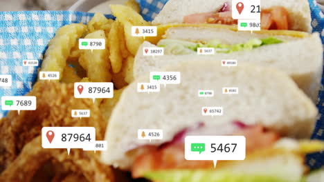 social media interaction icons animation over sandwiches and fries