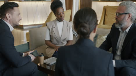 business meeting in hotel lobby