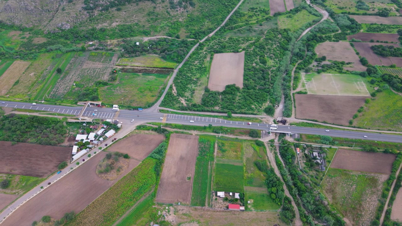 View of the Oaxaca Valley covered in summer vegetation, Drone