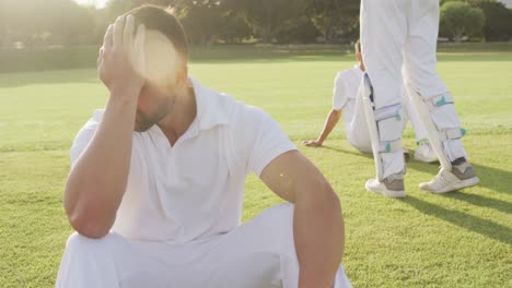 Jugador-De-Cricket-Sosteniendo-Su-Cabeza-Después-Del-Partido